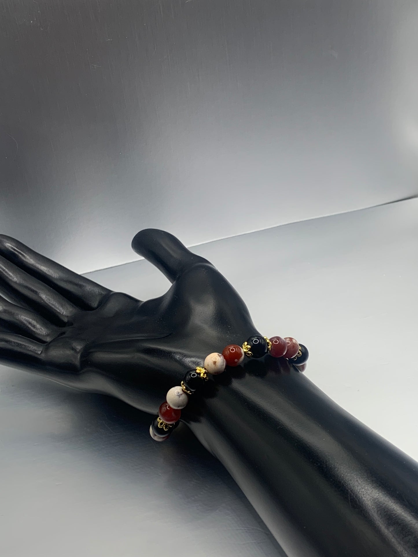 Black obsidian with red white orca agate semi precious stone/crystal beaded elastic bracelet with gold plated flower bead caps