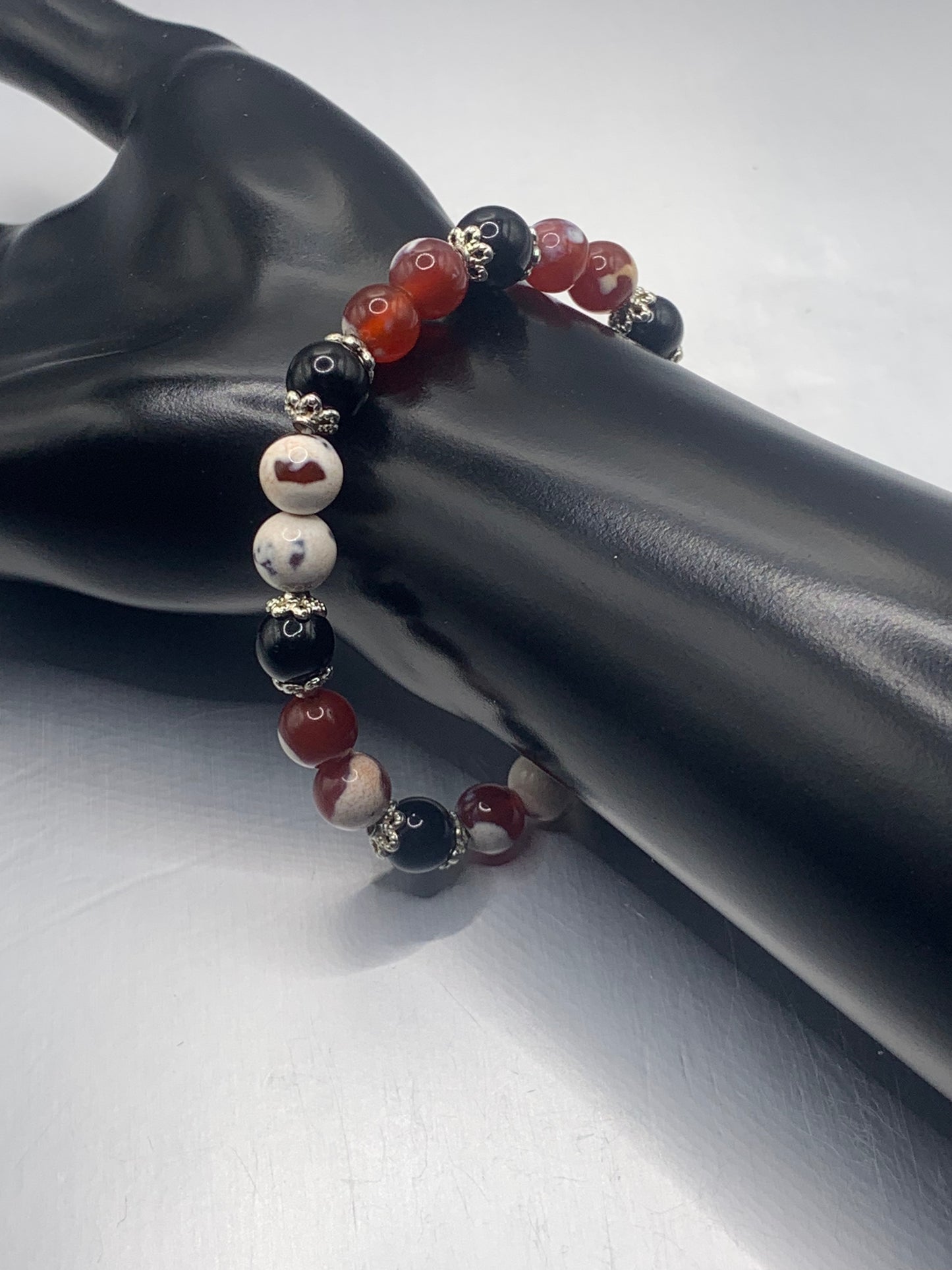 Black obsidian with red white orca agate semi precious stone/crystal beaded elastic bracelet with silver plated flower bead caps