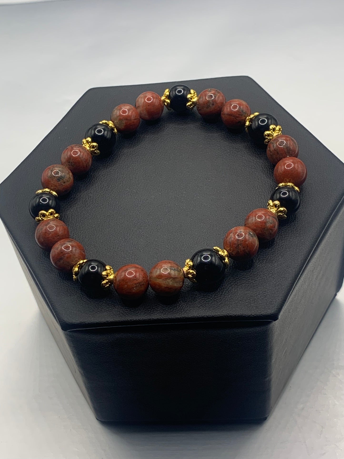 Black obsidian with red sesame jasper semi precious stone/crystal beaded elastic bracelet with gold plated flower bead caps