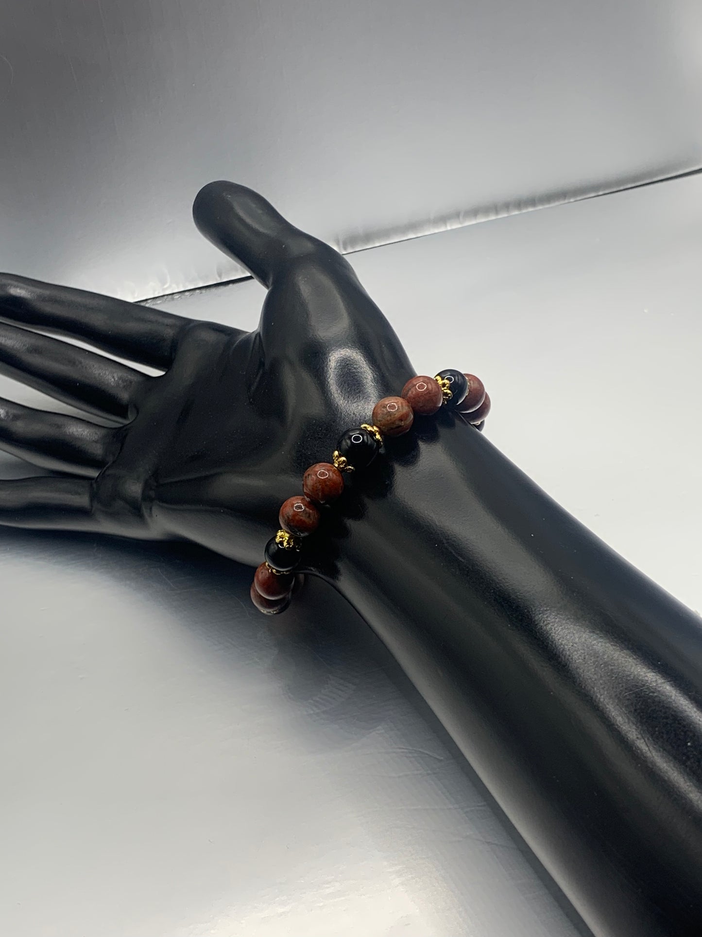 Black obsidian with red sesame jasper semi precious stone/crystal beaded elastic bracelet with gold plated flower bead caps