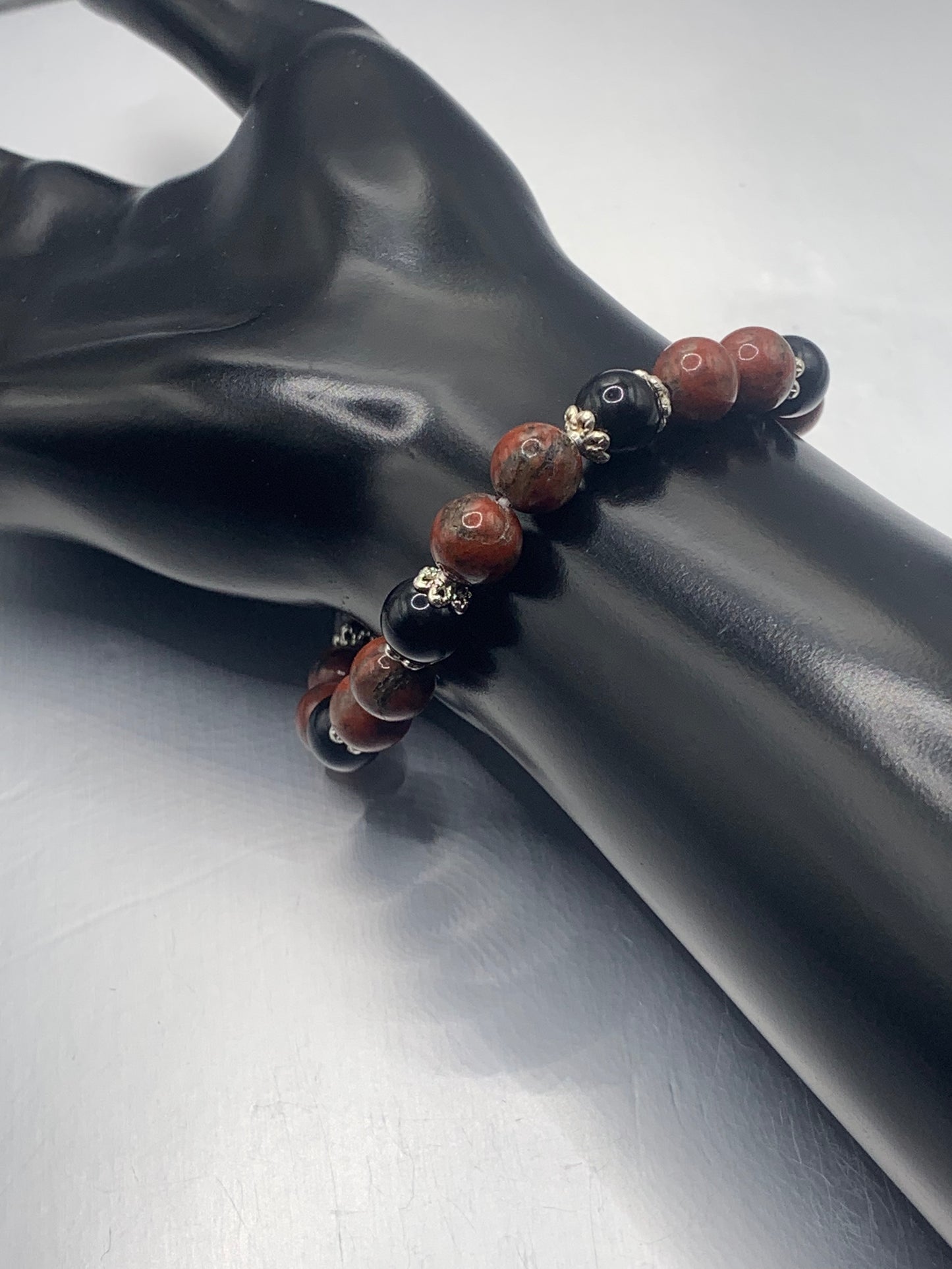 Black obsidian with red sesame jasper semi precious stone/crystal beaded elastic bracelet with silver plated flower bead caps
