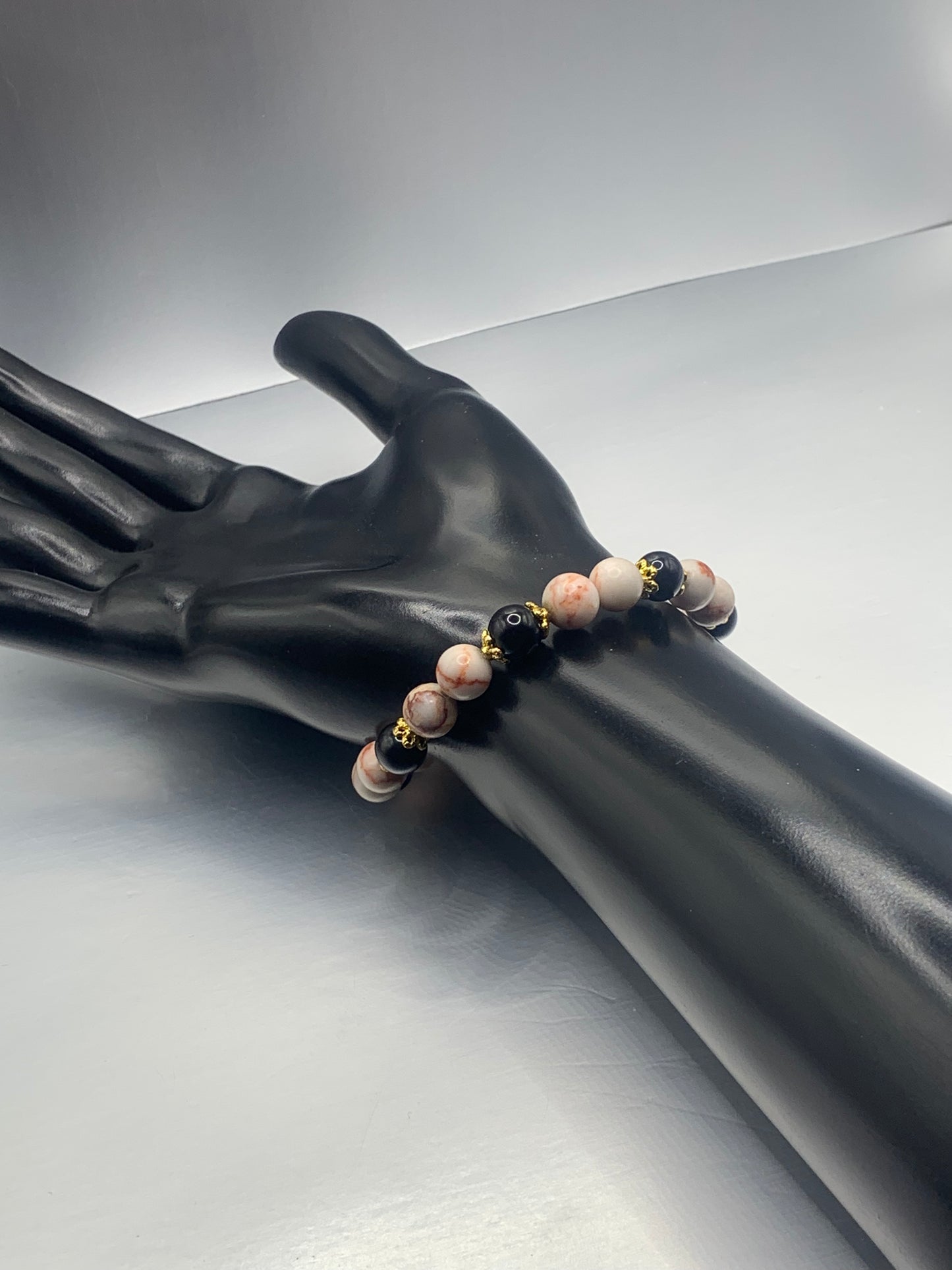 Black obsidian with red vein jasper semi precious stone/crystal beaded elastic bracelet with gold plated flower bead caps