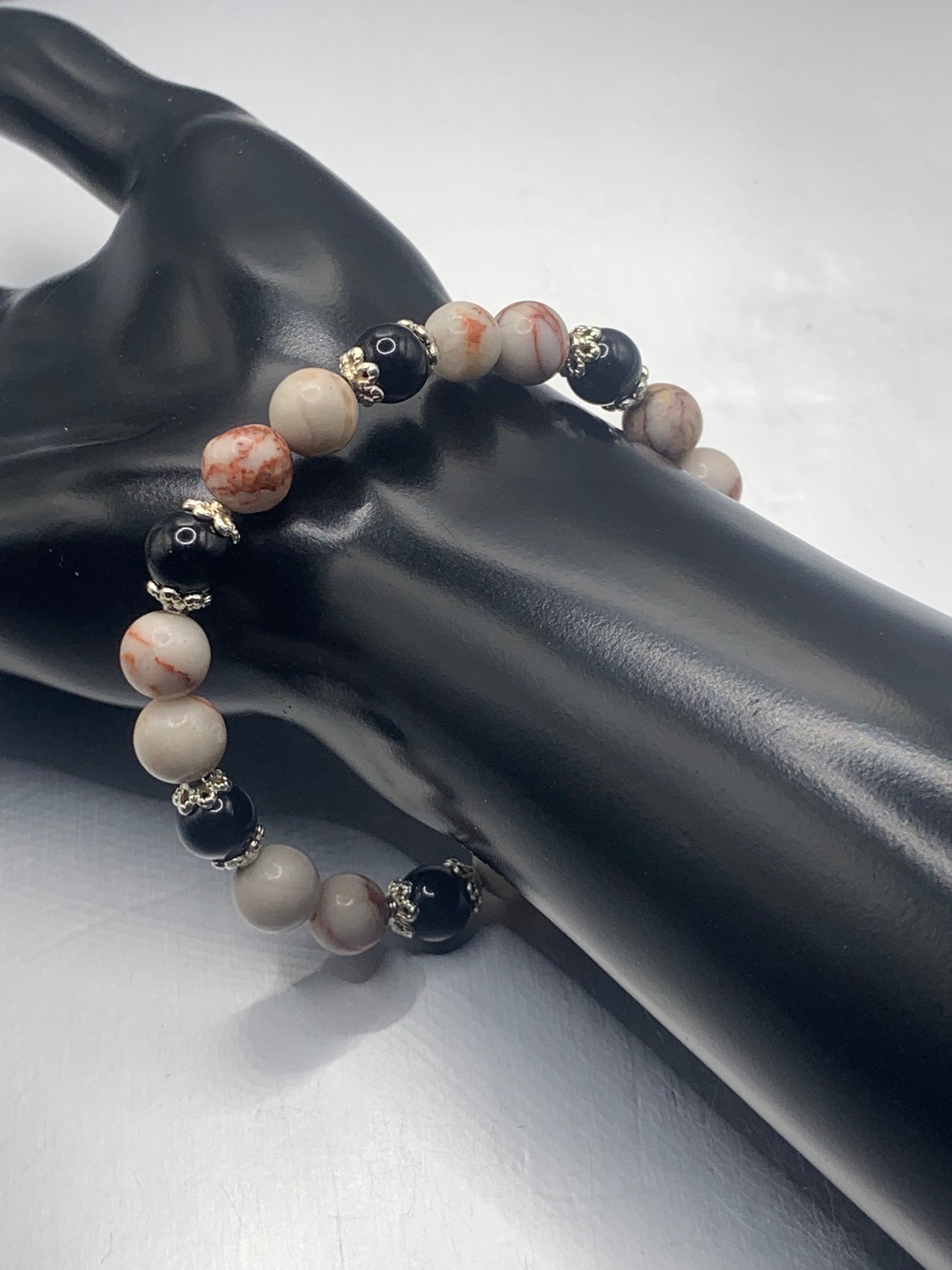 Black obsidian with red vein jasper semi precious stone/crystal beaded elastic bracelet with silver plated flower bead caps
