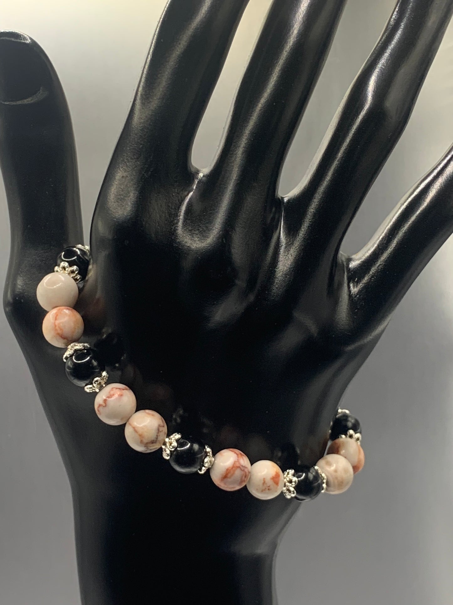 Black obsidian with red vein jasper semi precious stone/crystal beaded elastic bracelet with silver plated flower bead caps