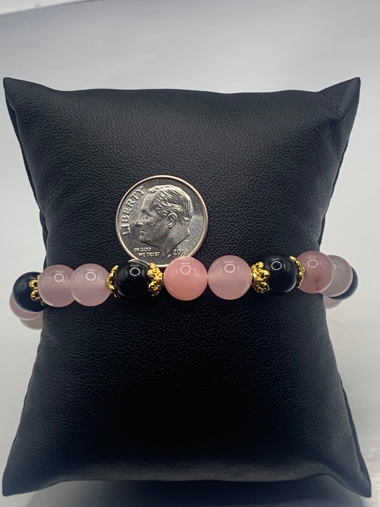 Black obsidian with rose quartz (enhanced) semi precious stone/crystal beaded elastic bracelet with gold plated flower bead caps