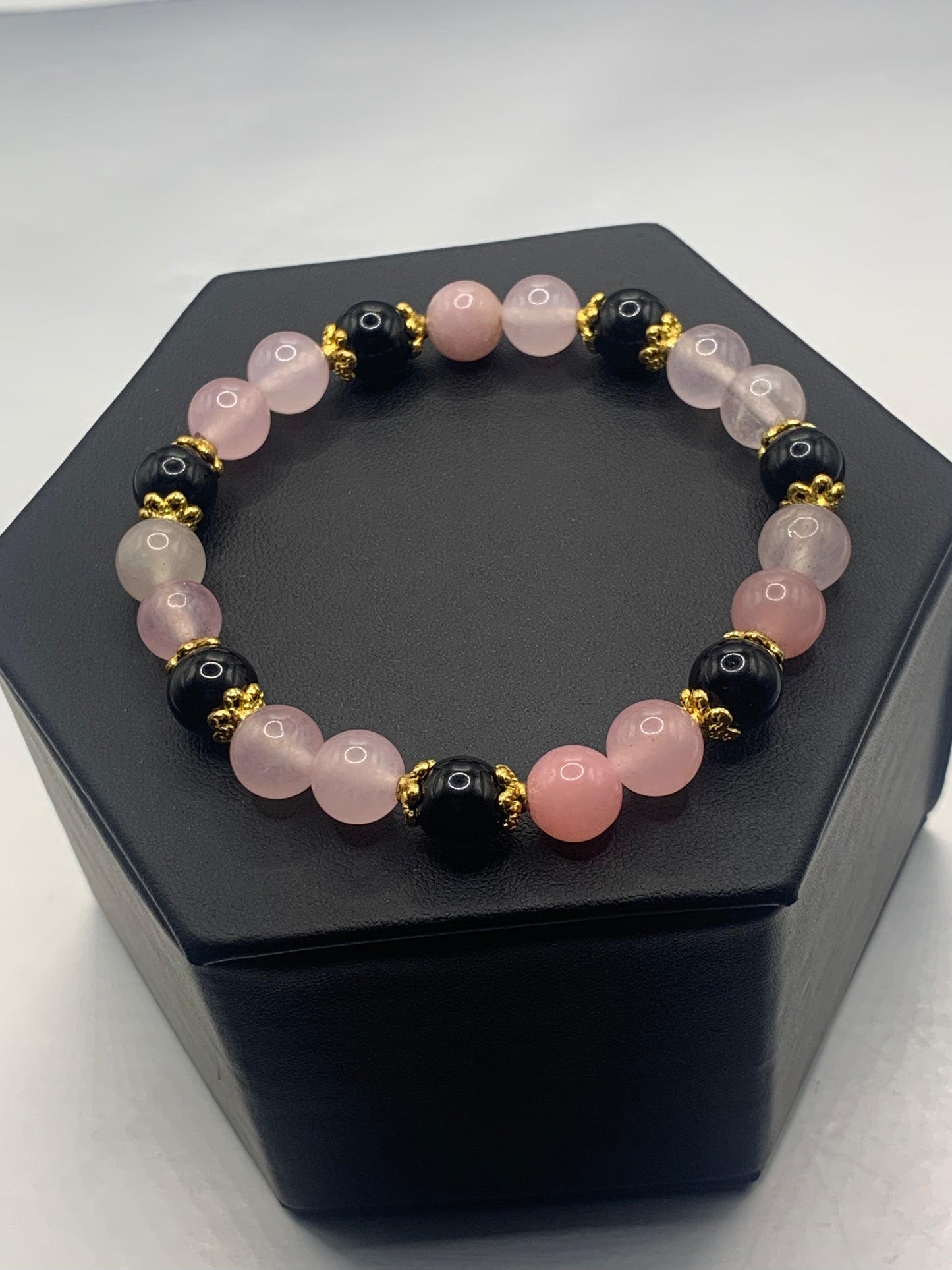 Black obsidian with rose quartz (enhanced) semi precious stone/crystal beaded elastic bracelet with gold plated flower bead caps
