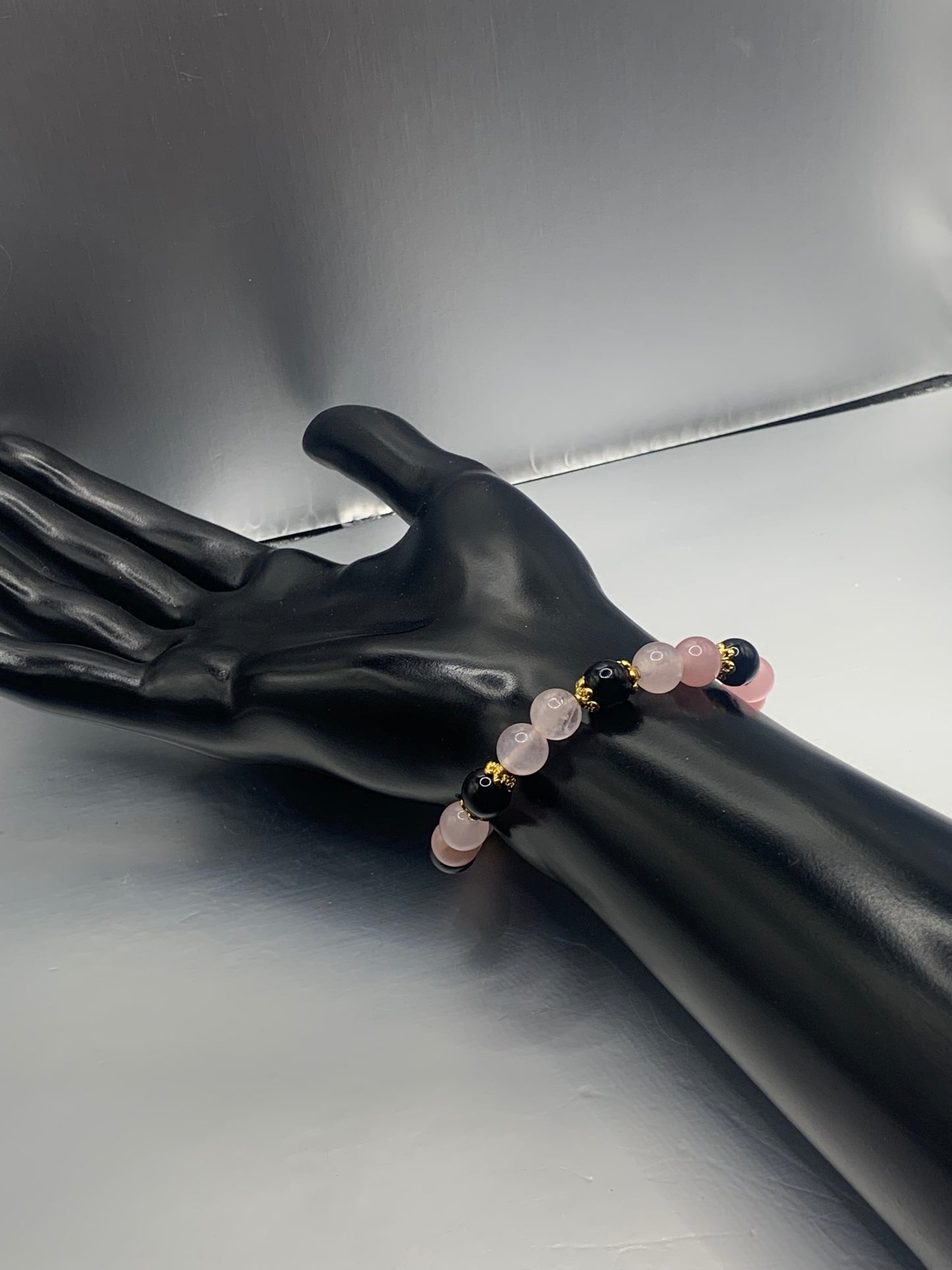 Black obsidian with rose quartz (enhanced) semi precious stone/crystal beaded elastic bracelet with gold plated flower bead caps
