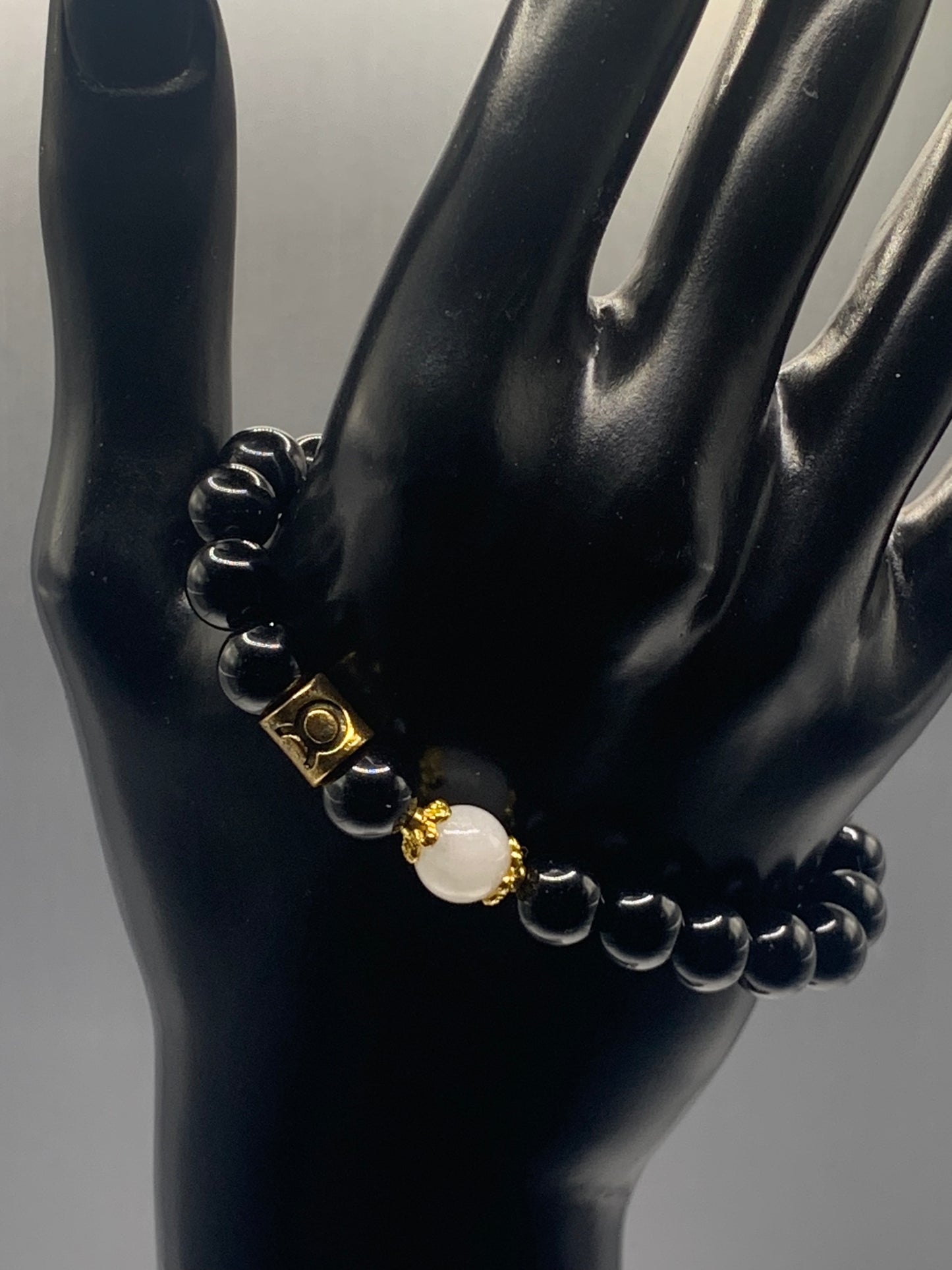 Taurus Zodiac black obsidian with white chalcedony semi precious stone/crystal elastic beaded bracelet with gold accents
