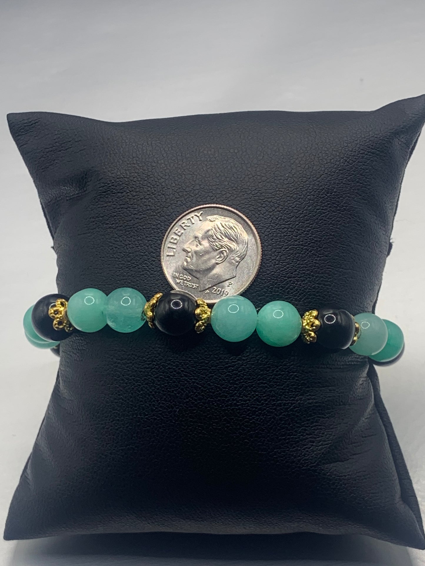Black obsidian with teal blue chalcedony semi precious stone/crystal beaded elastic bracelet with gold plated flower bead caps