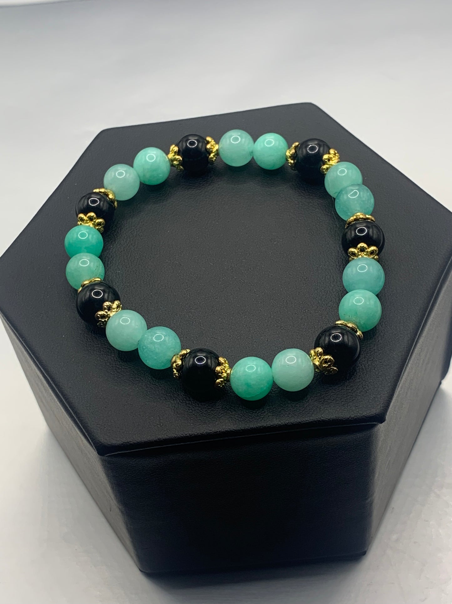 Black obsidian with teal blue chalcedony semi precious stone/crystal beaded elastic bracelet with gold plated flower bead caps