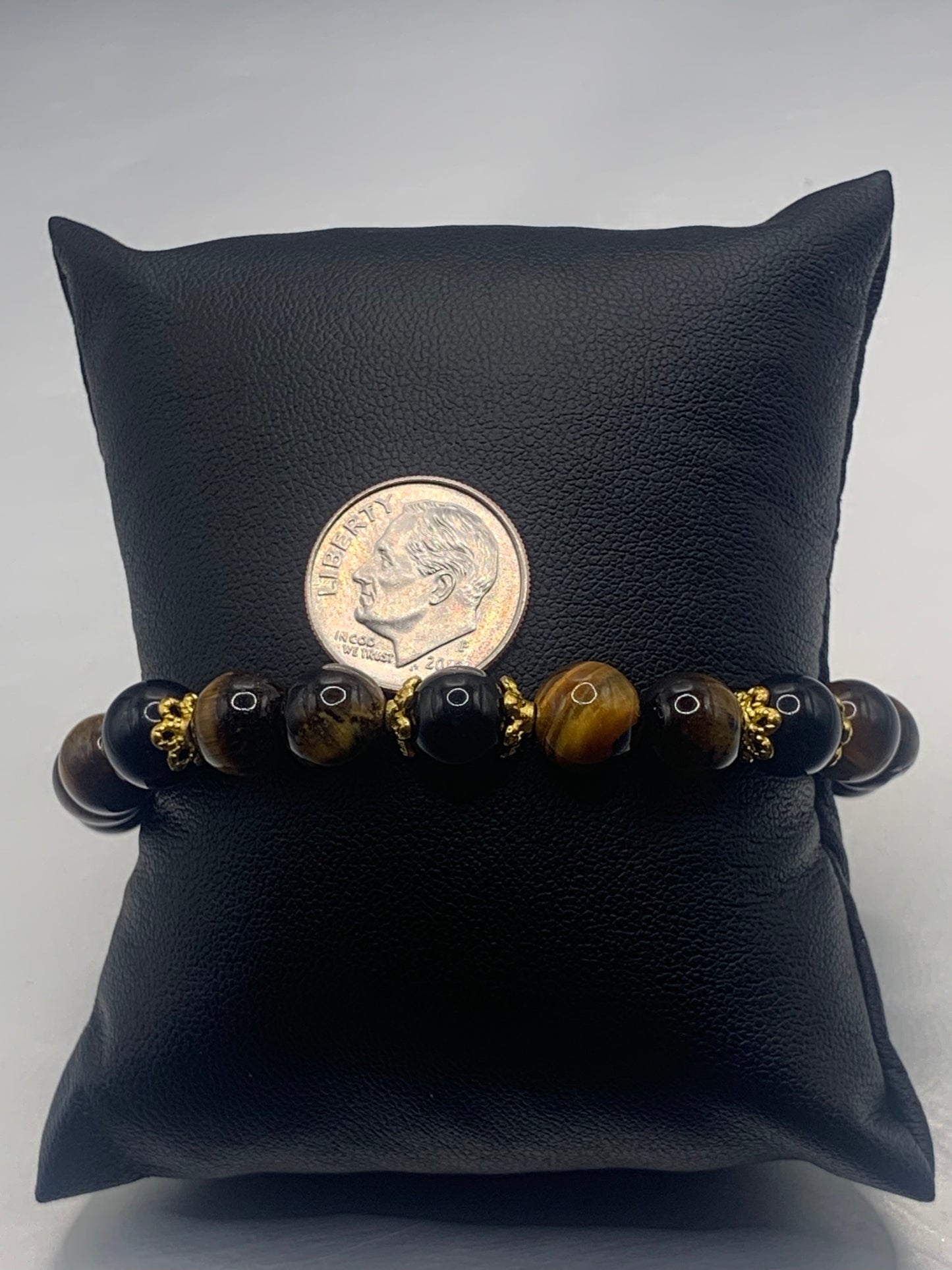 Black obsidian with tigers eye semi precious stone/crystal beaded elastic bracelet with gold plated flower bead caps