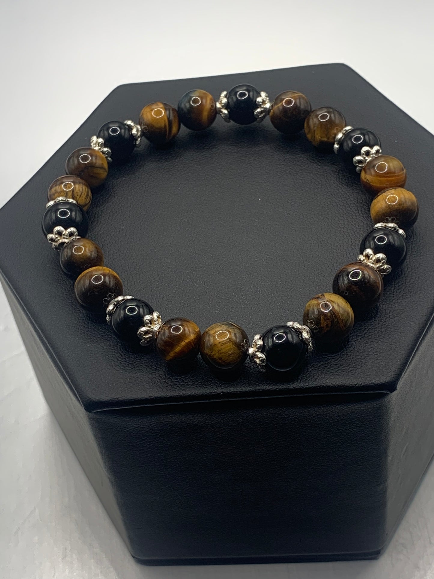 Black obsidian with tigers eye semi precious stone/crystal beaded elastic bracelet with silver plated flower bead caps