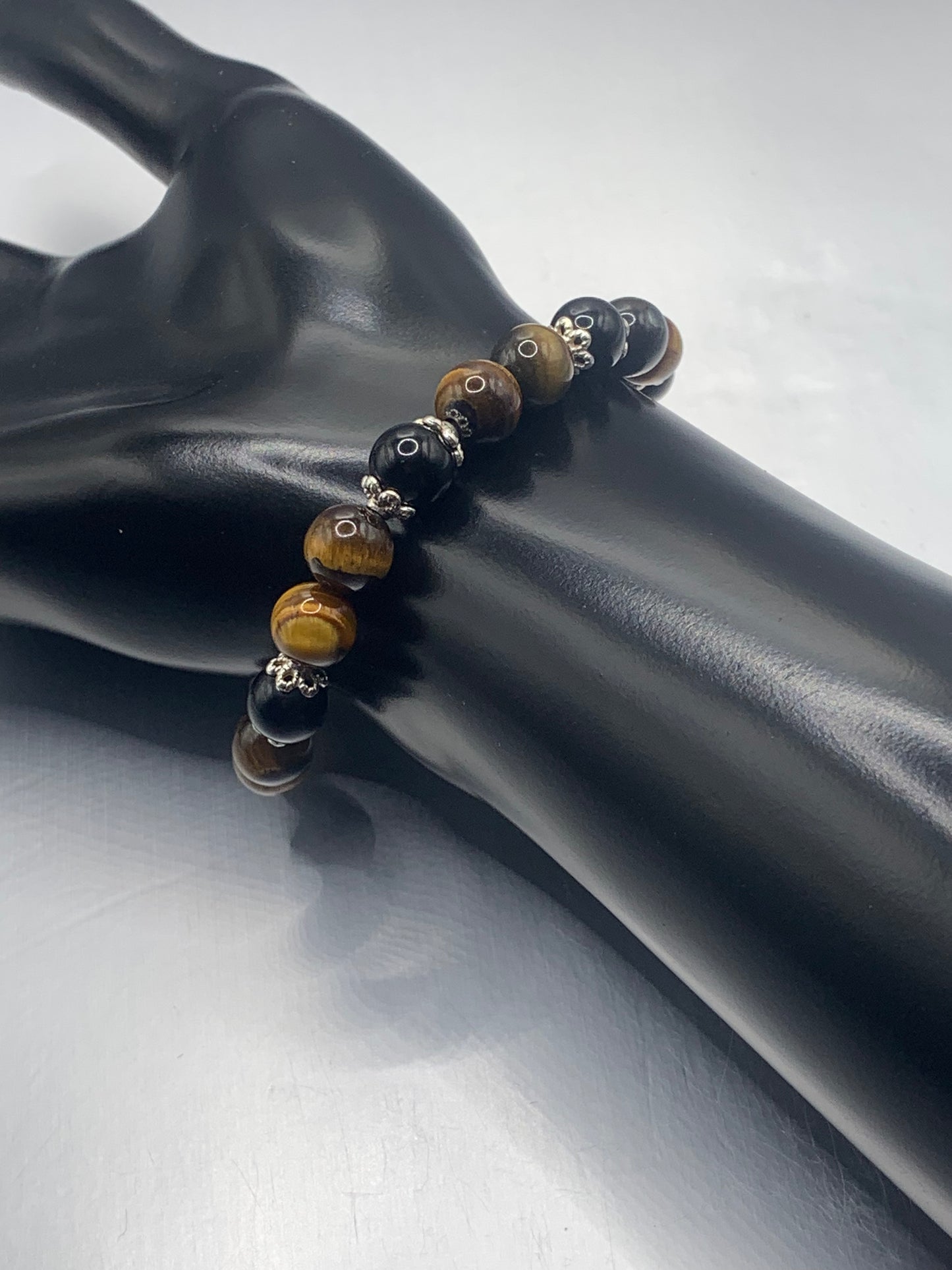 Black obsidian with tigers eye semi precious stone/crystal beaded elastic bracelet with silver plated flower bead caps
