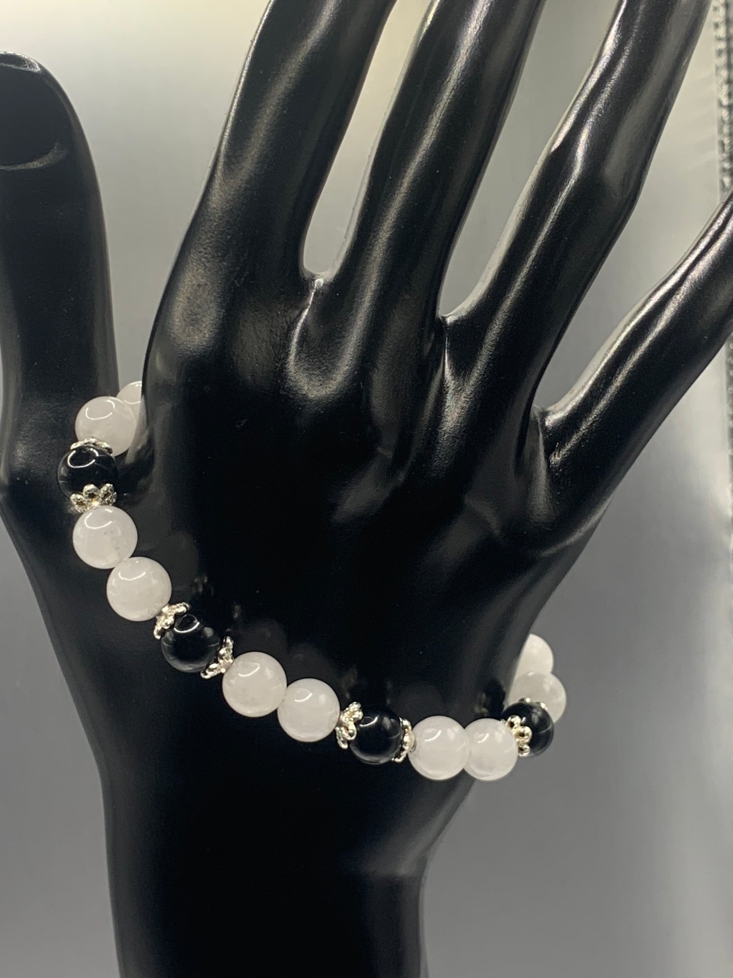 Black obsidian with white chalcedony semi precious stone/crystal beaded elastic bracelet with silver plated flower bead caps
