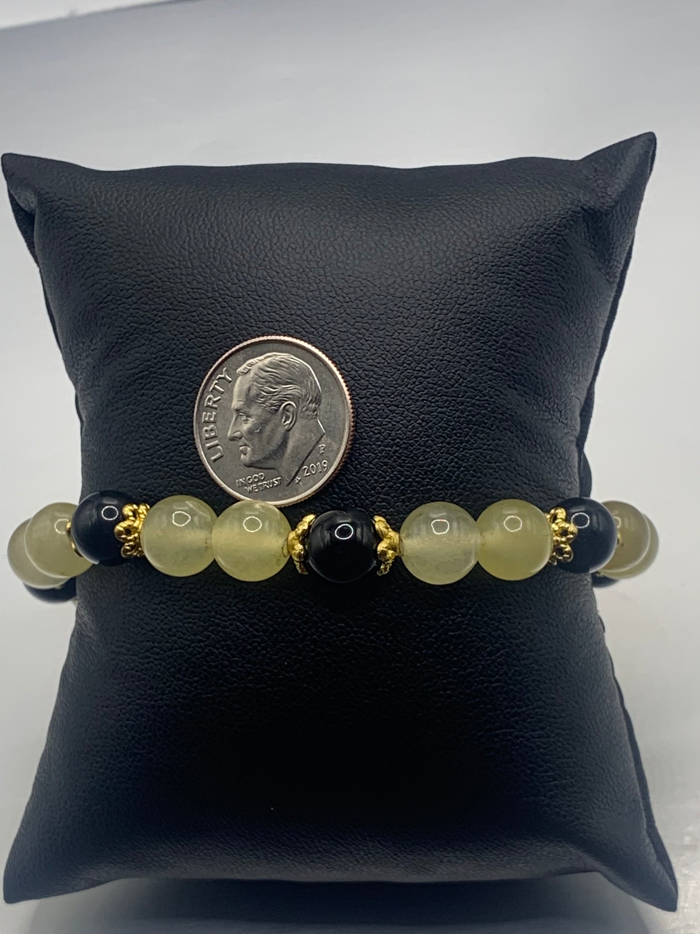 Black obsidian with yellow agate semi precious stone/crystal beaded elastic bracelet with gold plated flower bead caps
