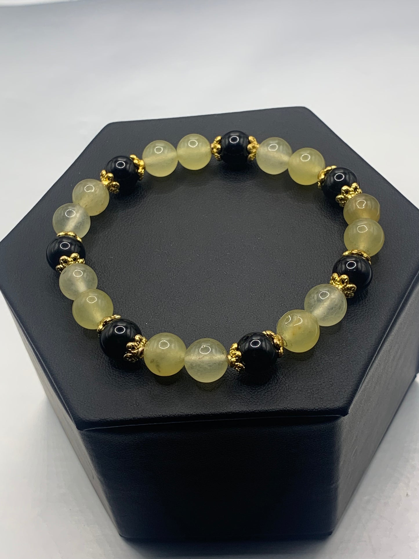 Black obsidian with yellow agate semi precious stone/crystal beaded elastic bracelet with gold plated flower bead caps