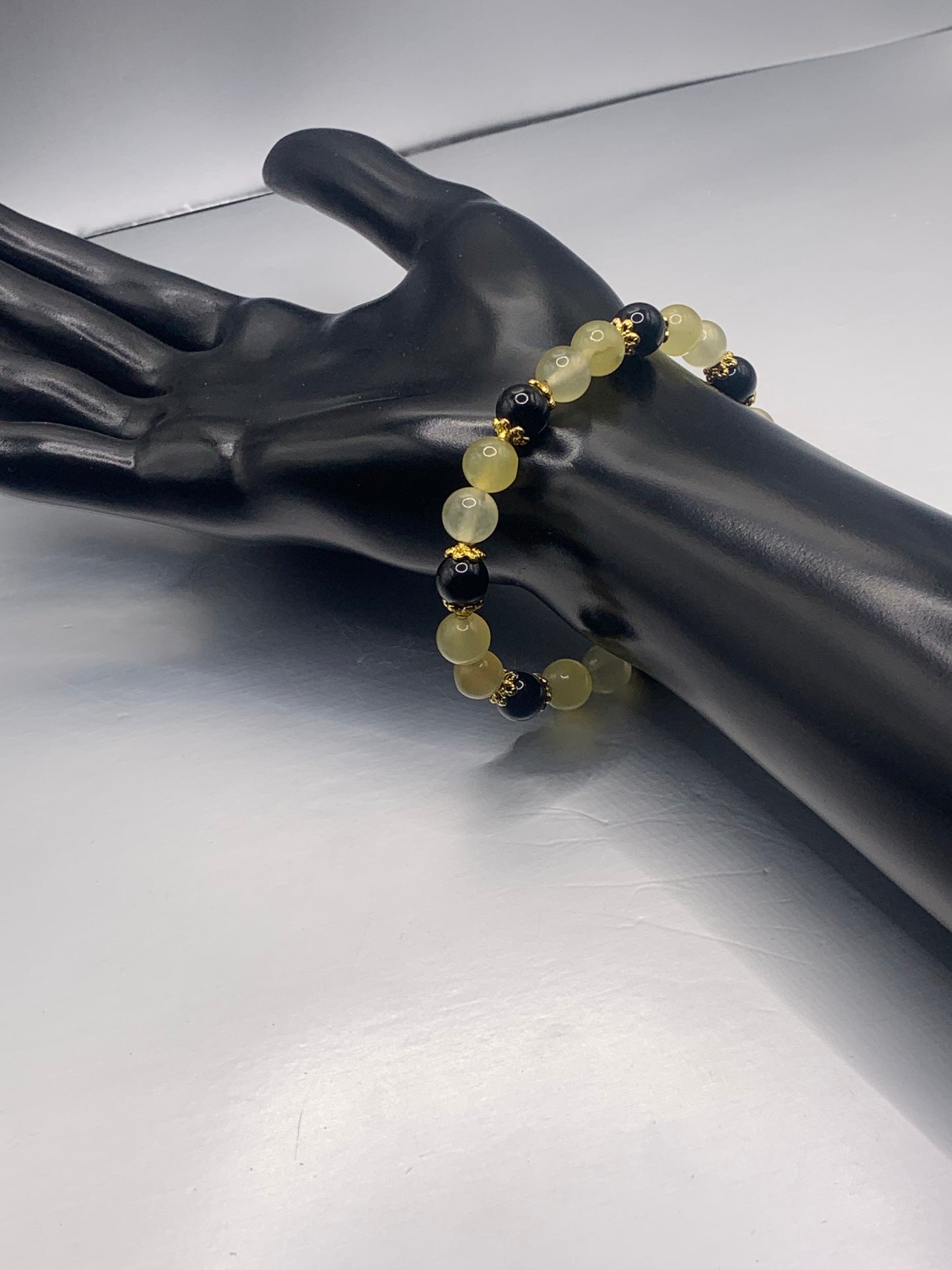 Black obsidian with yellow agate semi precious stone/crystal beaded elastic bracelet with gold plated flower bead caps