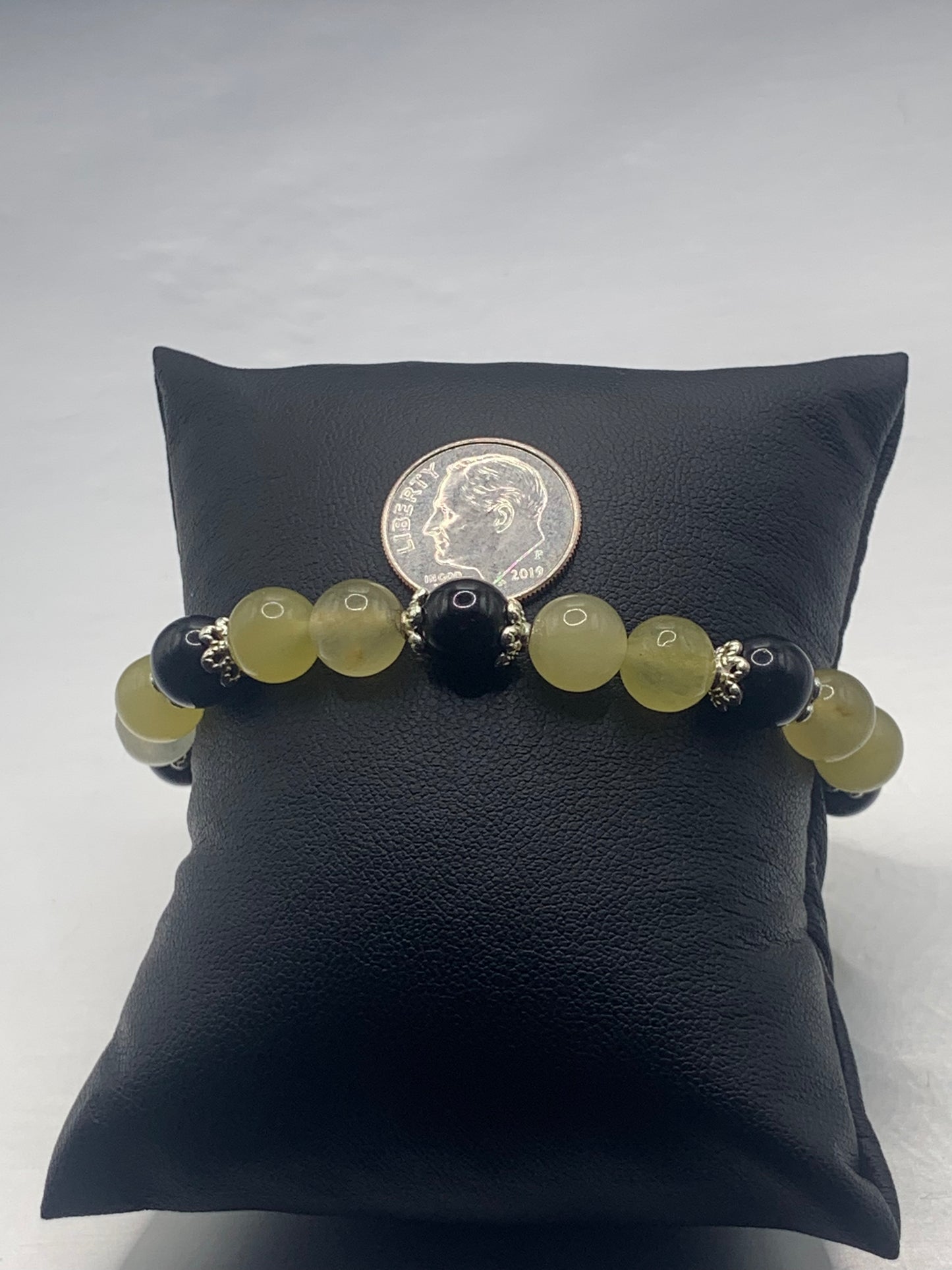 Black obsidian with yellow agate semi precious stone/crystal beaded elastic bracelet with silver plated flower bead caps