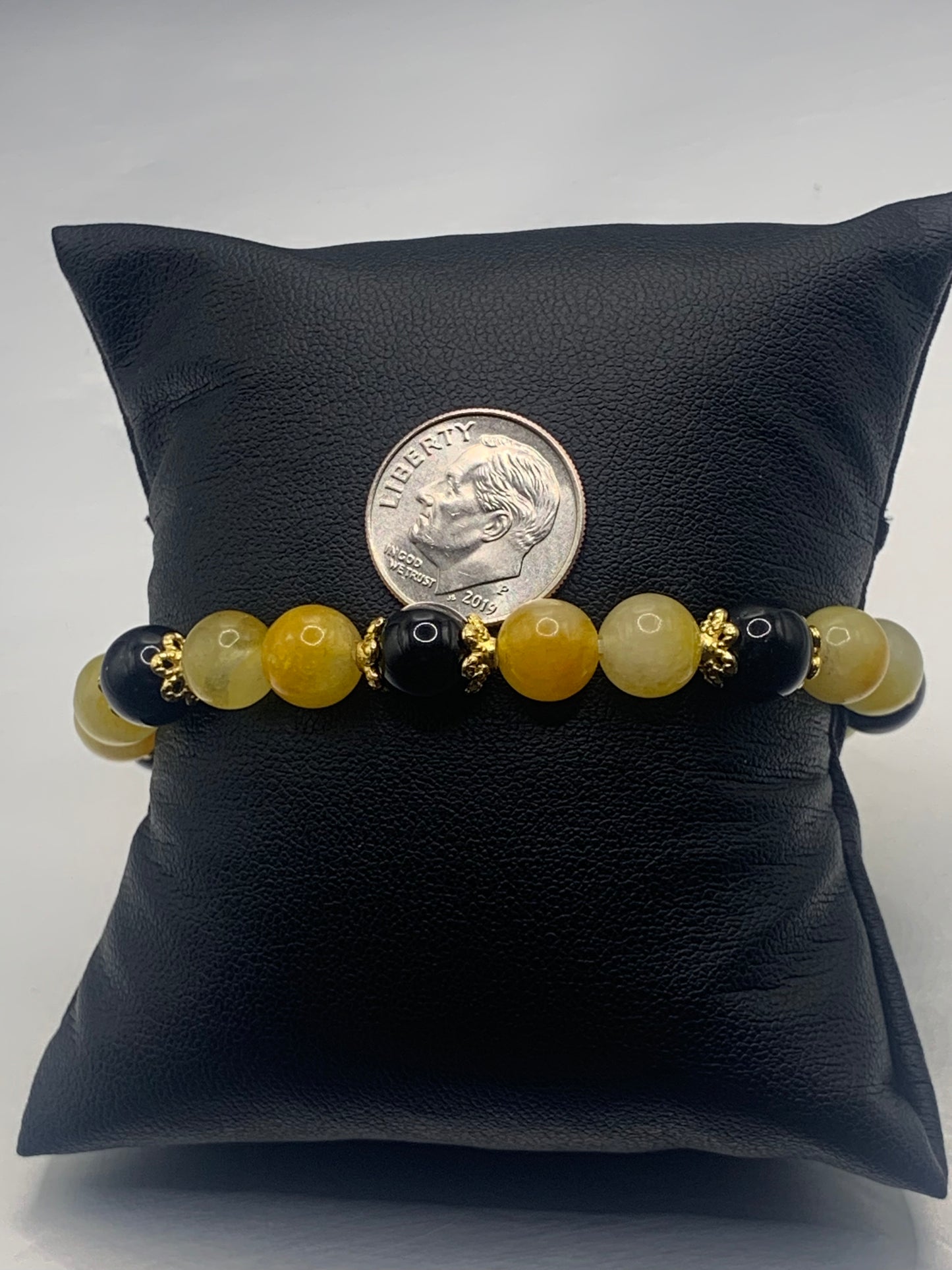 Black obsidian with yellow white chalcedony semi precious stone/crystal beaded elastic bracelet with gold plated flower bead caps