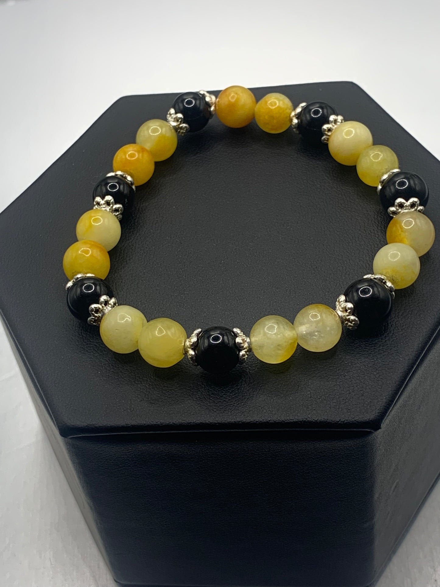 Black obsidian with yellow white chalcedony semi precious stone/crystal beaded elastic bracelet with silver plated flower bead caps