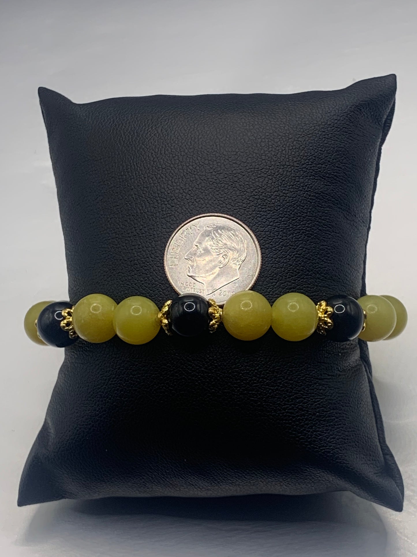 Black obsidian with yellow jade semi precious stone/crystal beaded elastic bracelet with gold plated flower bead caps