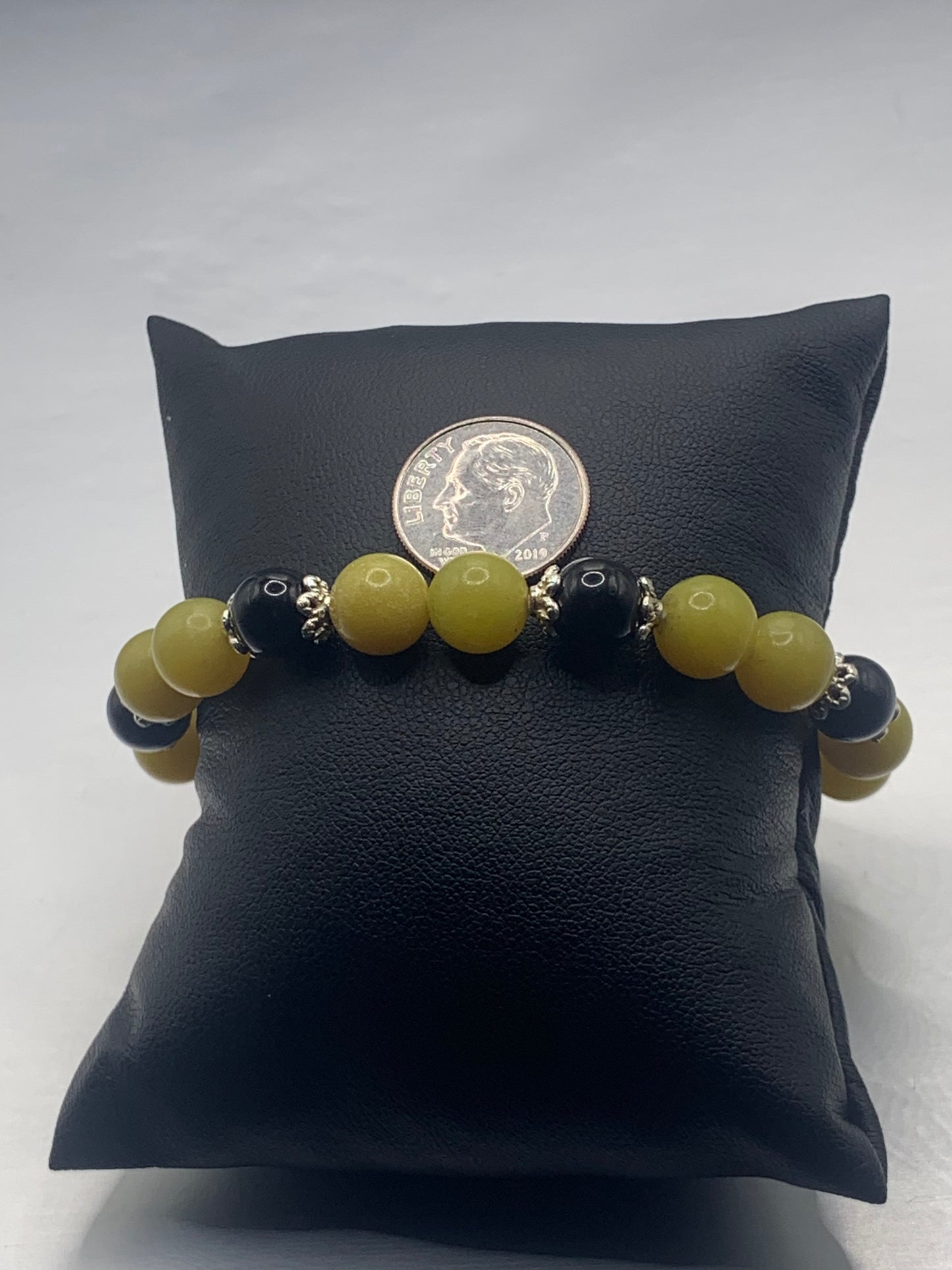 Black obsidian with yellow jade semi precious stone/crystal beaded elastic bracelet with silver plated flower bead caps