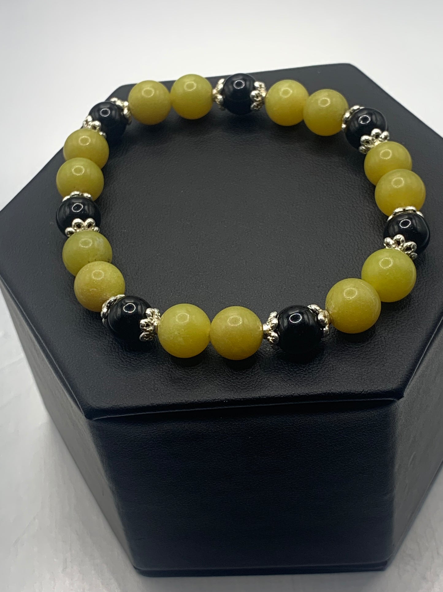 Black obsidian with yellow jade semi precious stone/crystal beaded elastic bracelet with silver plated flower bead caps