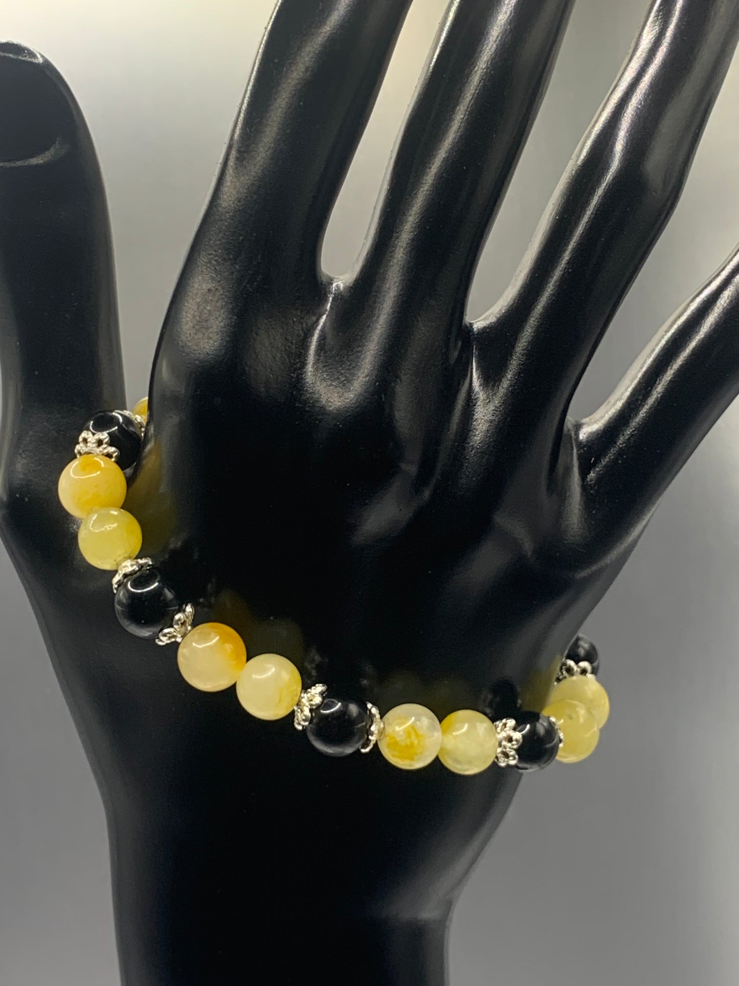 Black obsidian with yellow white chalcedony semi precious stone/crystal beaded elastic bracelet with silver plated flower bead caps