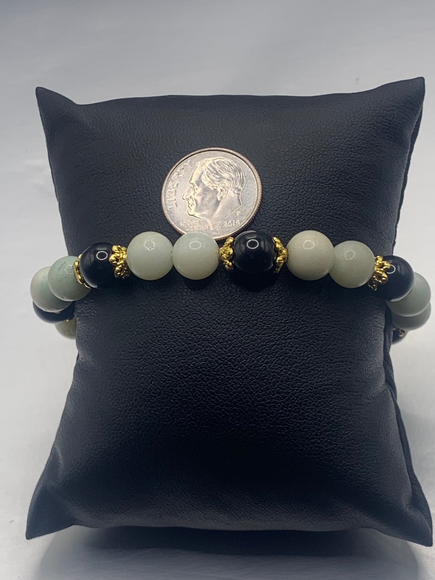 Black obsidian with amazonite semi precious stone/crystal beaded elastic bracelet with gold plated flower bead caps