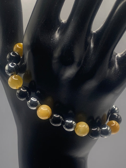Hematite, black obsidian, and yellow tigers eye semi precious stone/crystal elastic beaded bracelet