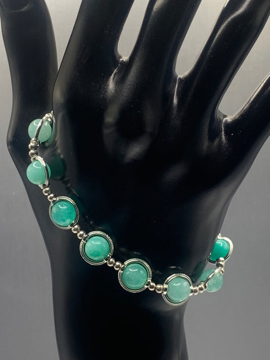 Teal chalcedony semi precious stone/crystal elastic beaded bracelet with silver colored rings