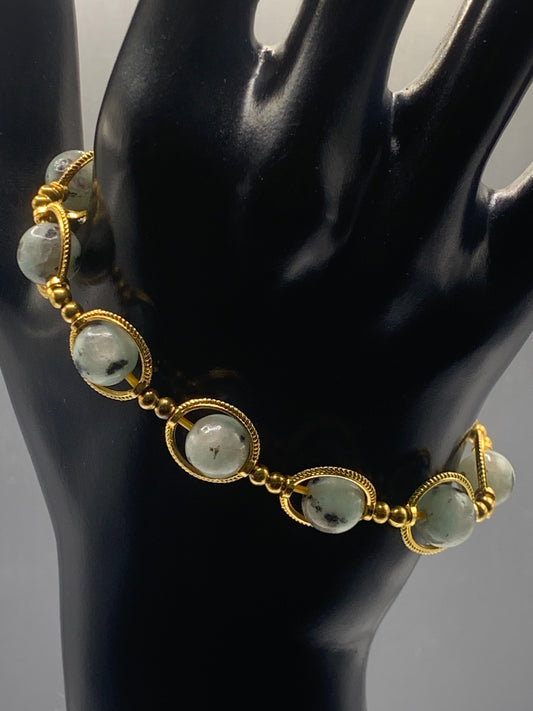 Kiwi jasper semi precious stone/crystal elastic beaded bracelet with gold colored rings