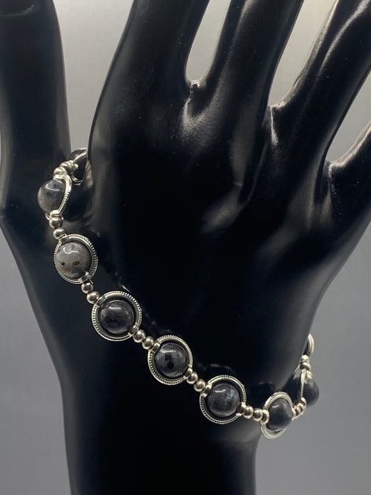 Larvikite semi precious stone/crystal elastic beaded bracelet with silver colored rings