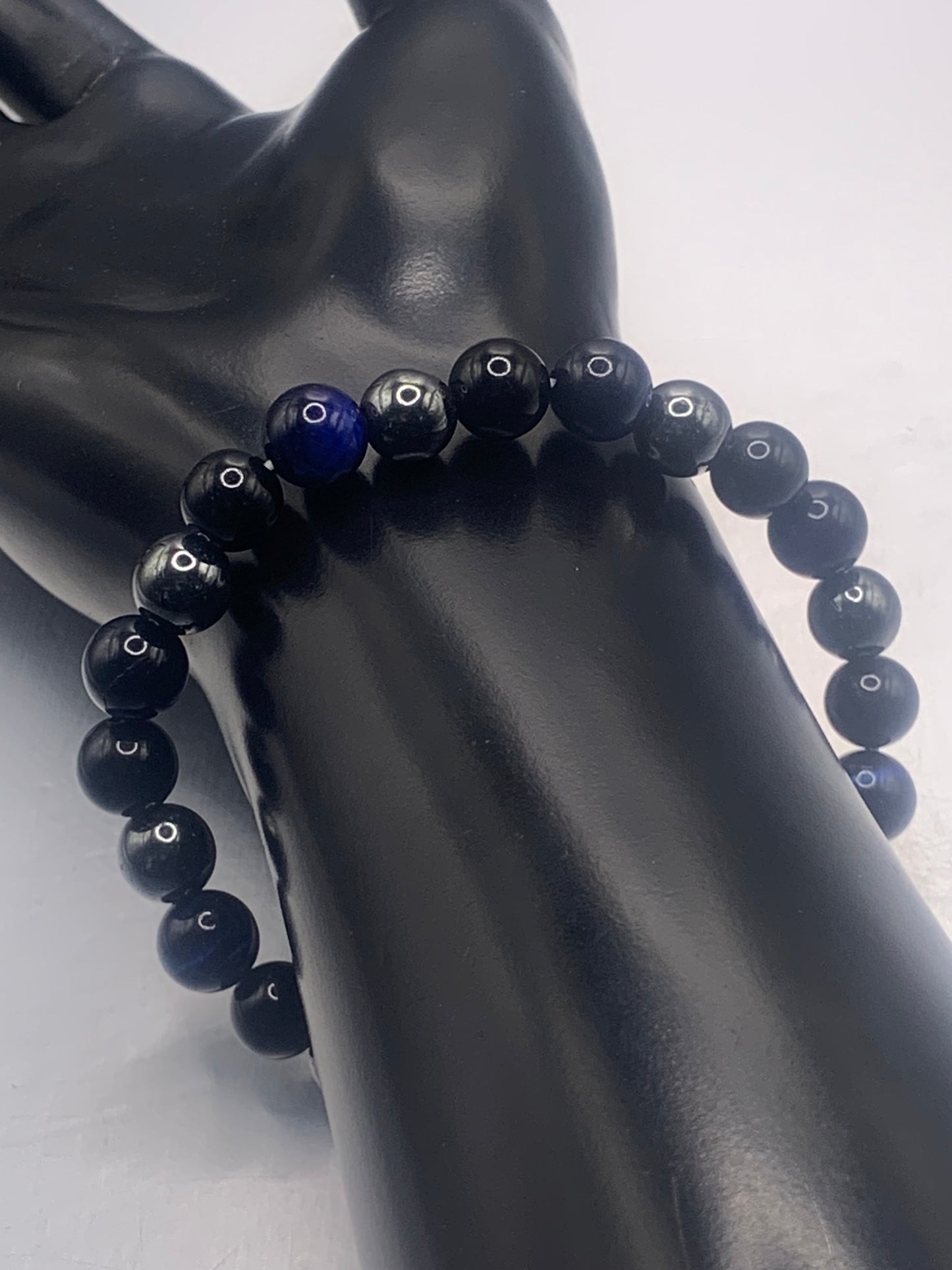 Hematite, black obsidian, and blue tigers eye semi precious stone/crystal elastic beaded bracelet