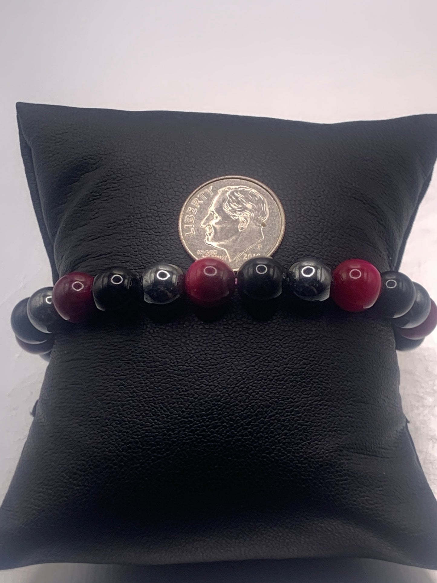 Hematite, black obsidian, and pink tigers eye semi precious stone/crystal elastic beaded bracelet
