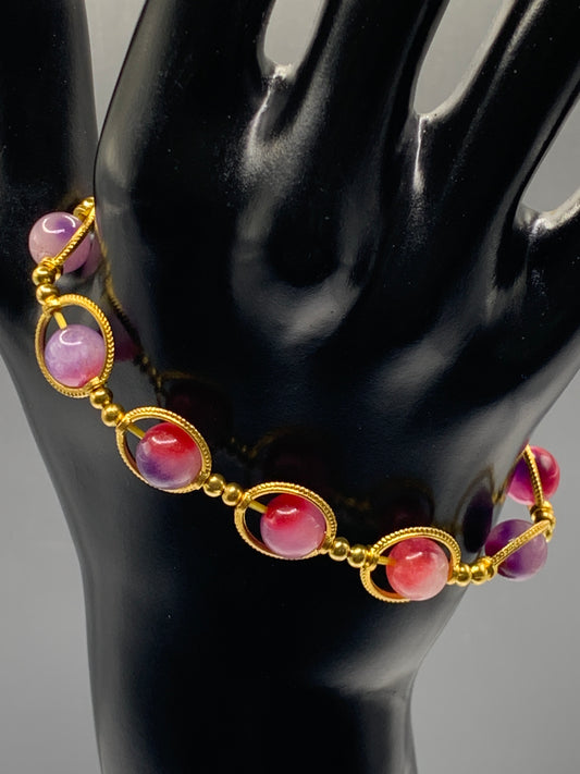 Purple pink chalcedony semi precious stone/crystal elastic beaded bracelet with gold colored rings