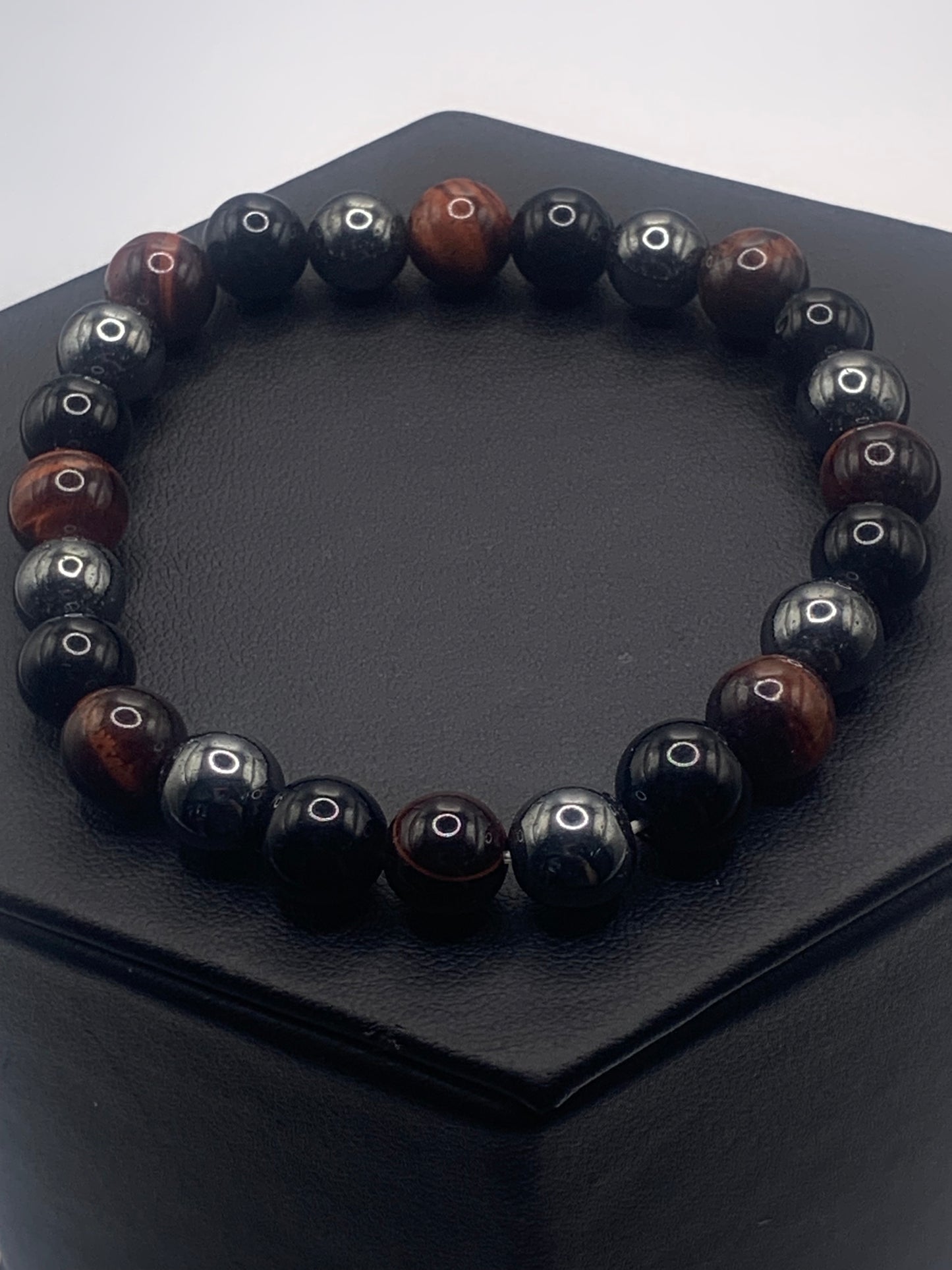 Hematite, black obsidian, and red tigers eye semi precious stone/crystal elastic beaded bracelet