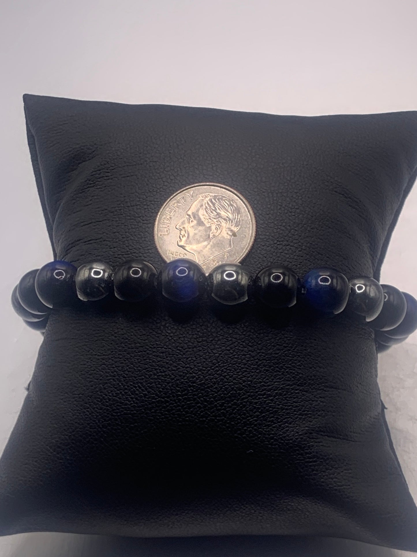 Hematite, black obsidian, and blue tigers eye semi precious stone/crystal elastic beaded bracelet