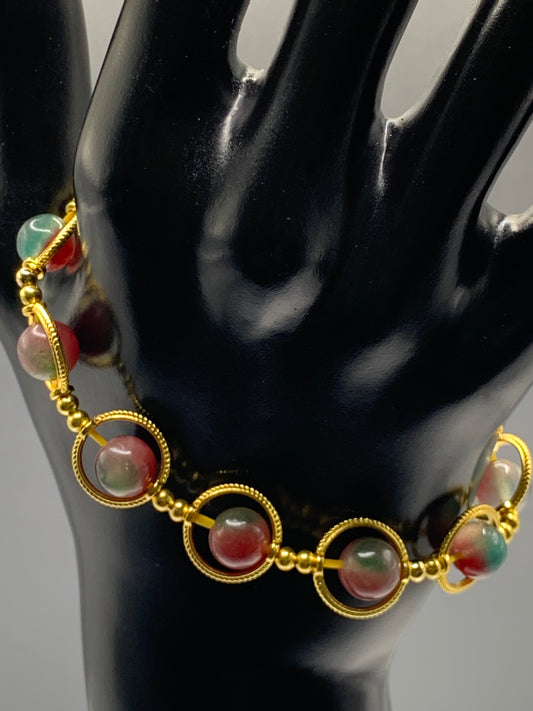 Blueberry chalcedony semi precious stone/crystal elastic beaded bracelet with gold colored rings