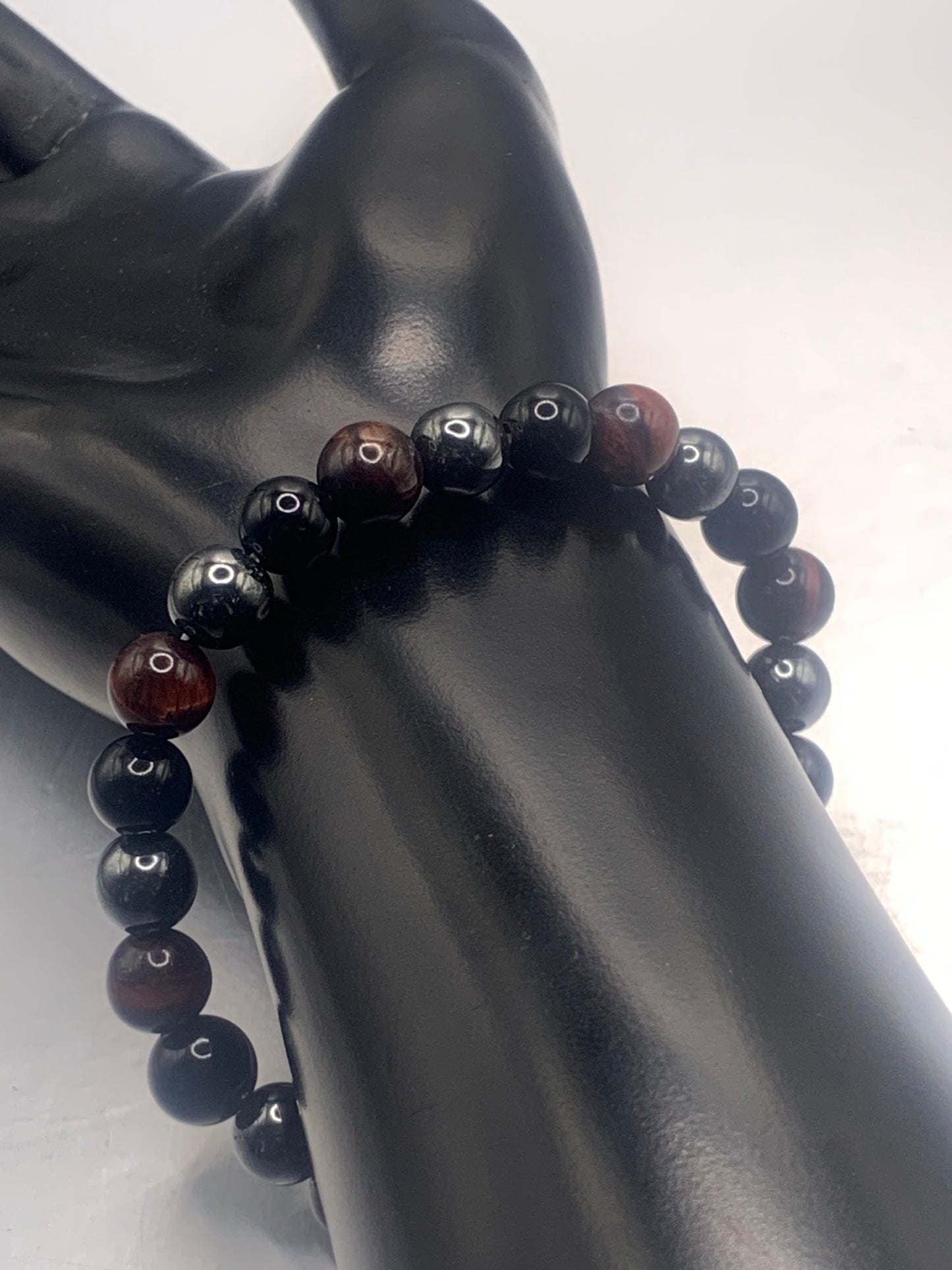 Hematite, black obsidian, and red tigers eye semi precious stone/crystal elastic beaded bracelet