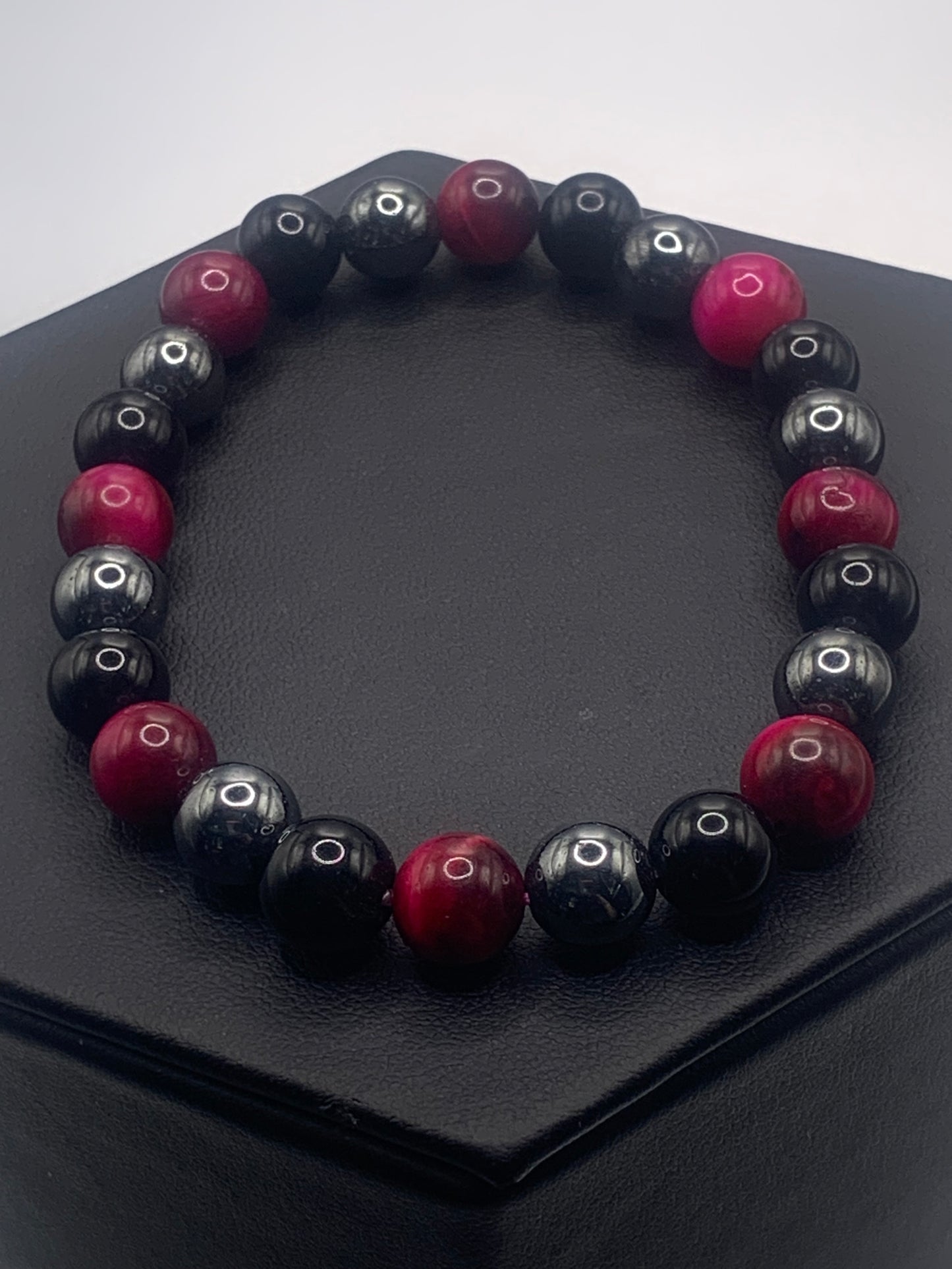 Hematite, black obsidian, and pink tigers eye semi precious stone/crystal elastic beaded bracelet