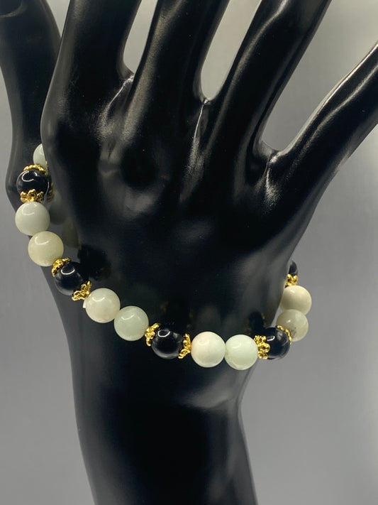 Black obsidian with amazonite semi precious stone/crystal beaded elastic bracelet with gold plated flower bead caps