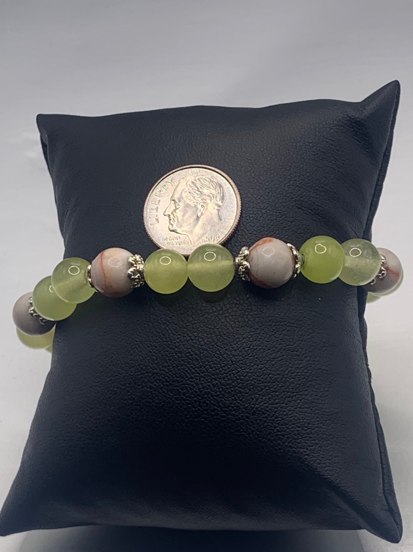 Red vein jasper and apple agate semi precious stone/crystal elastic beaded bracelet with silver plated flower bead caps