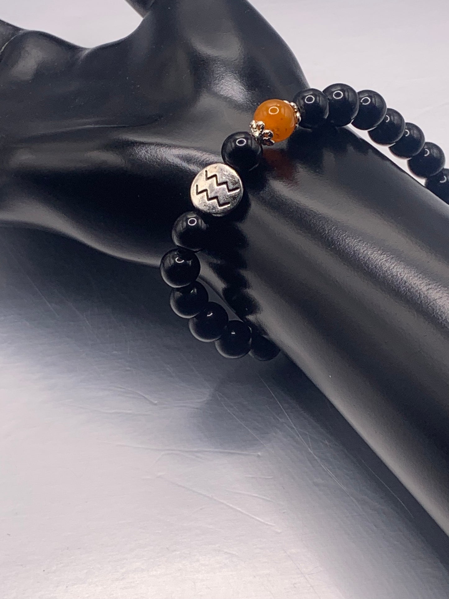 Aquarius Zodiac black obsidian with orange agate semi precious stone/crystal elastic beaded bracelet with silver accents