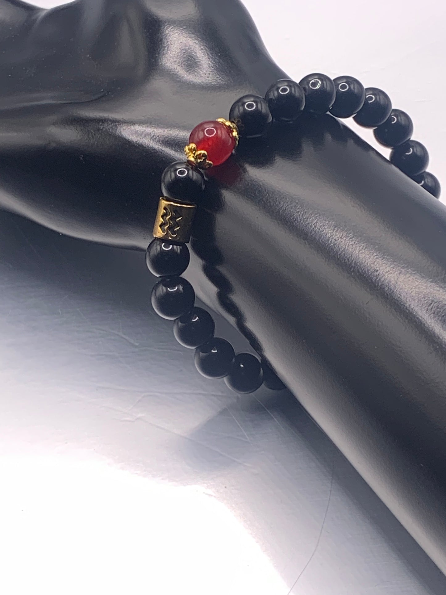 Aquarius Zodiac black obsidian with red chalcedony semi precious stone/crystal elastic beaded bracelet with gold accents