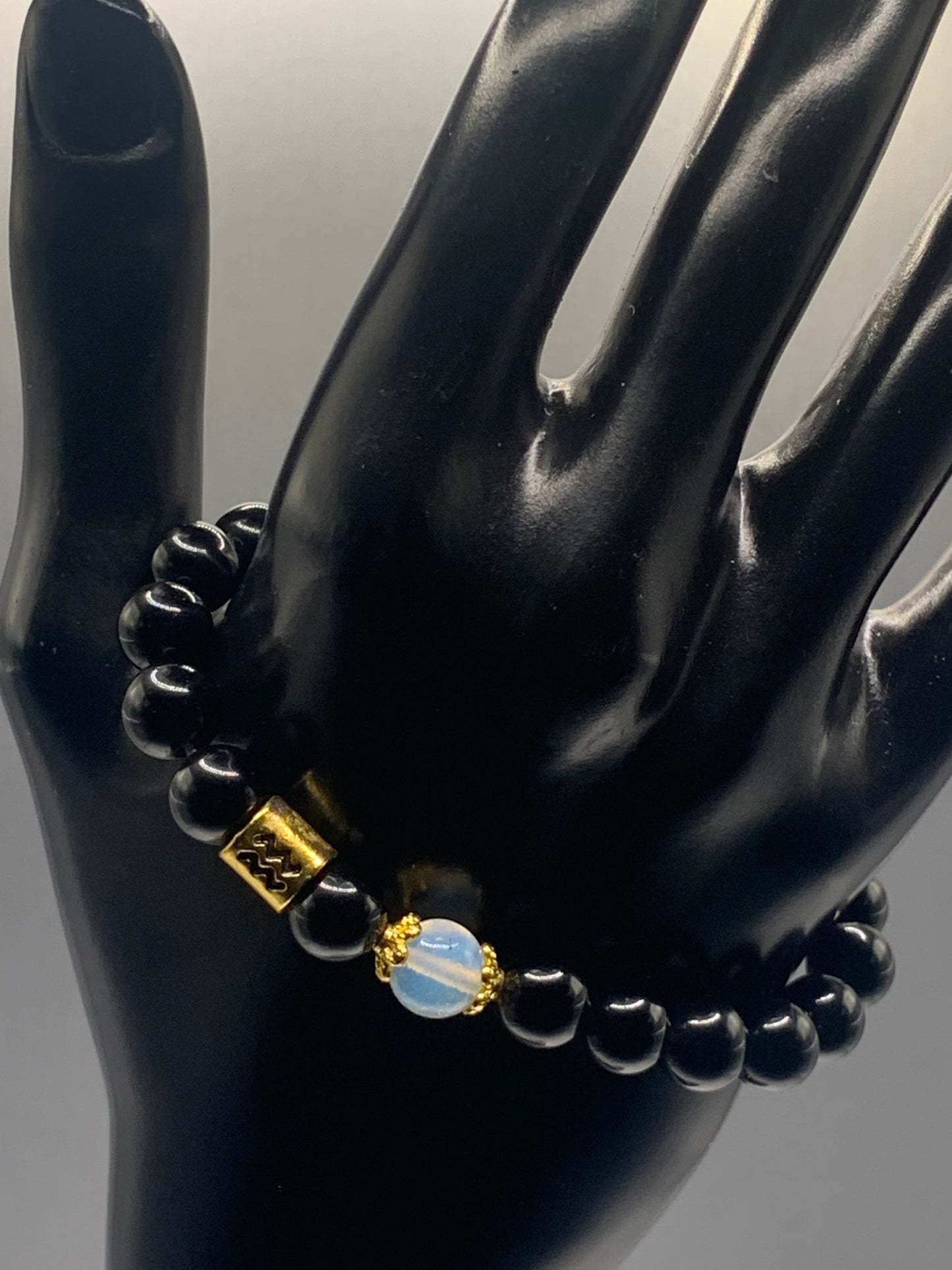 Aquarius Zodiac black obsidian with opalite semi precious stone/crystal elastic beaded bracelet with gold accents