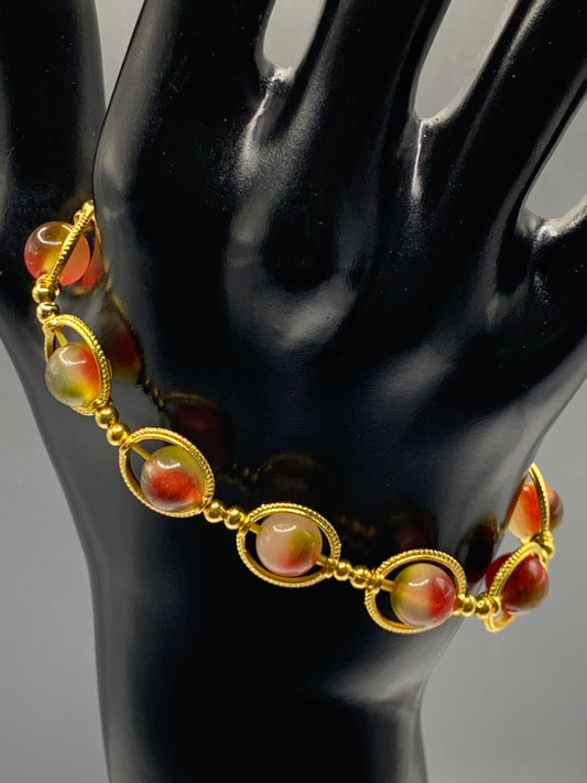 Watermelon chalcedony semi precious stone/crystal elastic beaded bracelet with gold colored rings
