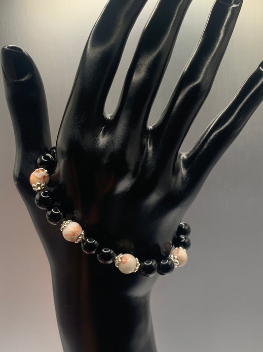 Red vein jasper and black obsidian semi precious stone/crystal elastic beaded bracelet with silver plated flower bead caps