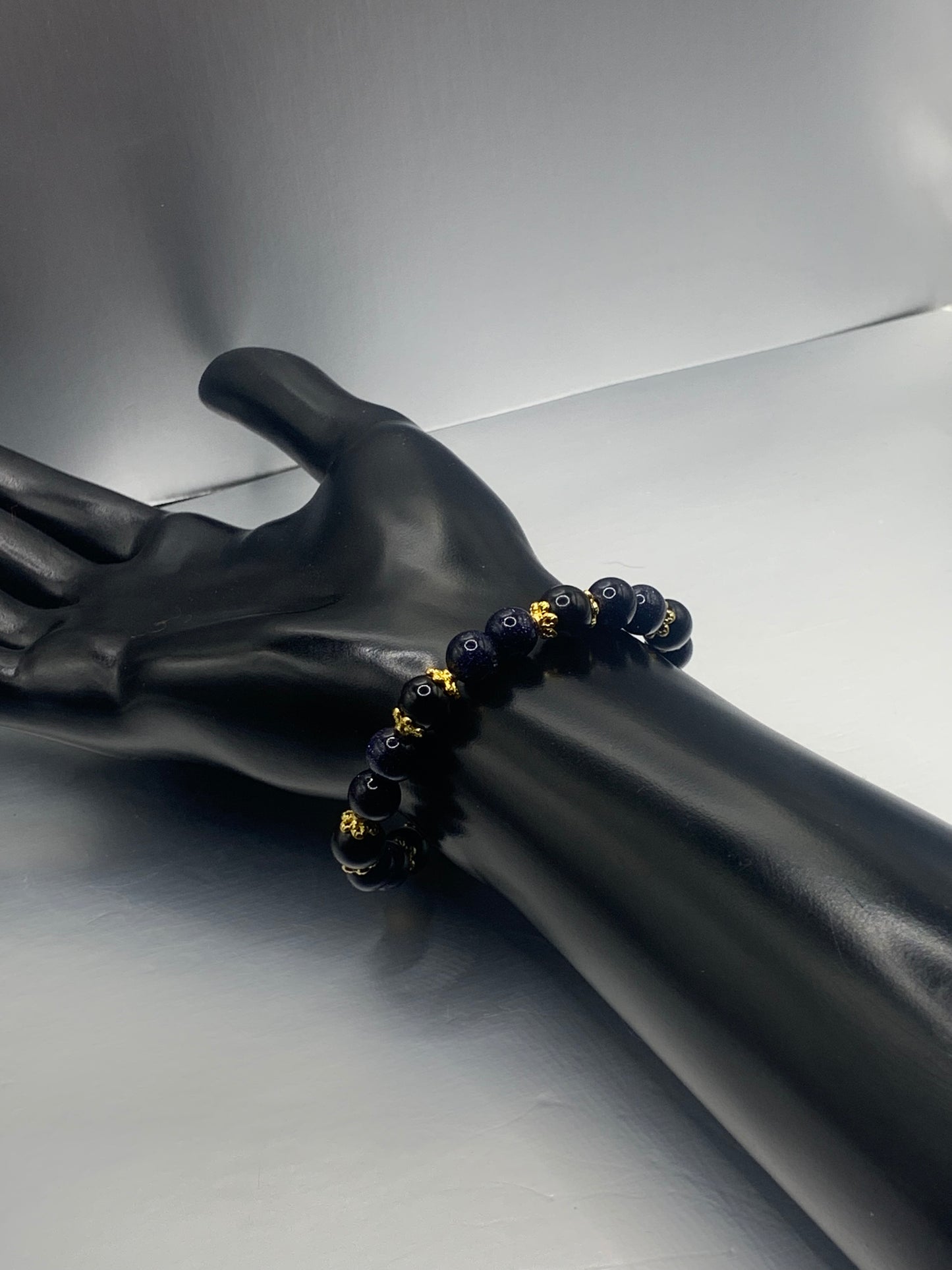 Black obsidian with blue sandstone semi precious stone/crystal beaded elastic bracelet with gold plated flower bead caps