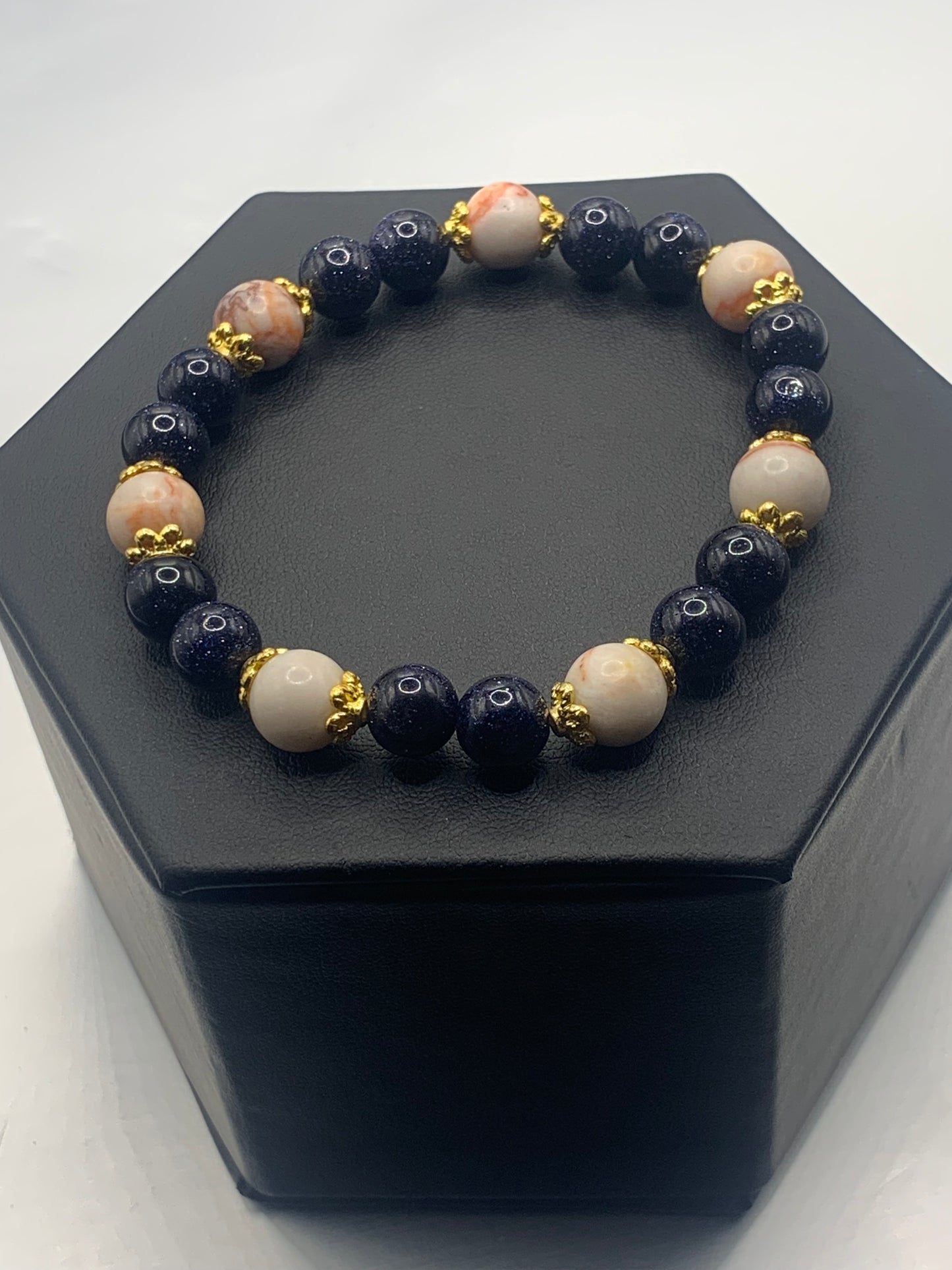 Red vein jasper and blue sandstone semi precious stone/crystal elastic beaded bracelet with gold plated flower bead caps